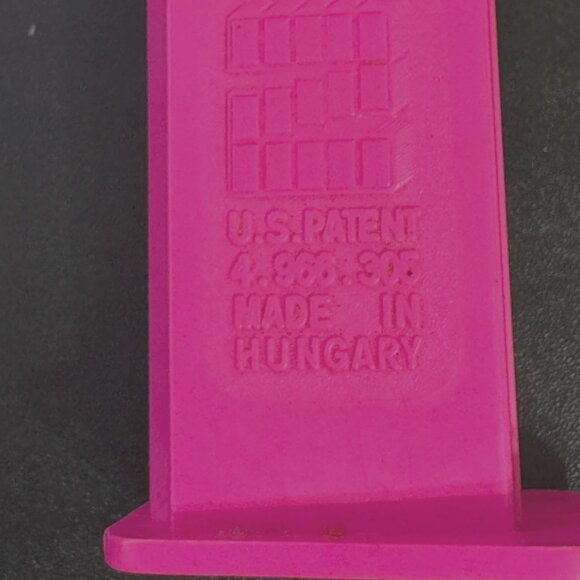 PEZ Candy Dispenser Walmart Smiley Funky Face, Neon Pink Stem, Hungary, 2000 - Picture 10 of 15